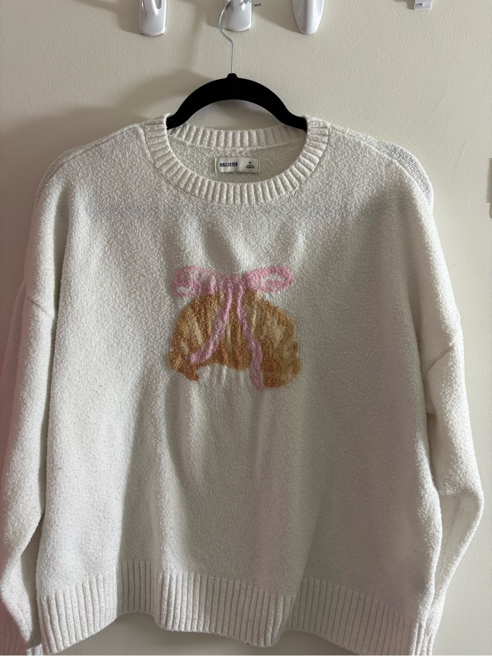 Hollister Cream Crewneck Sweater with Pink Bow and Tan Graphic